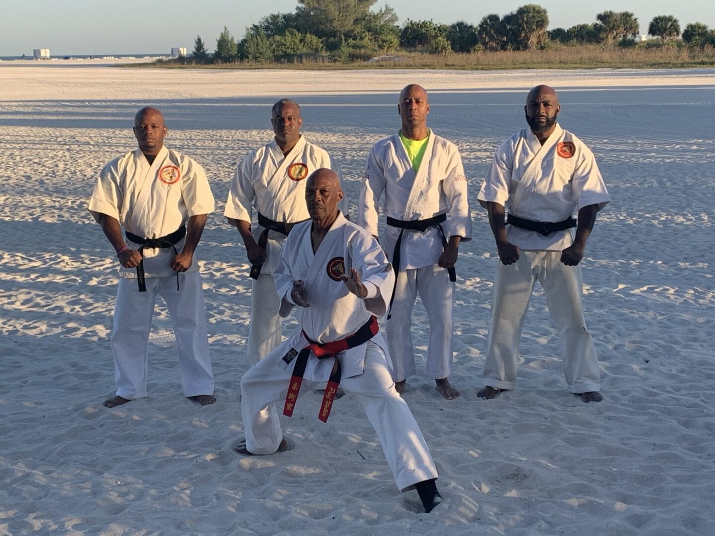 A group of people wearing karate wear